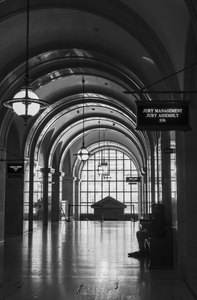 The hallway leading to the Jury Management office and Assembly room in the Milwaukee County Courthouse can be seen on the right.