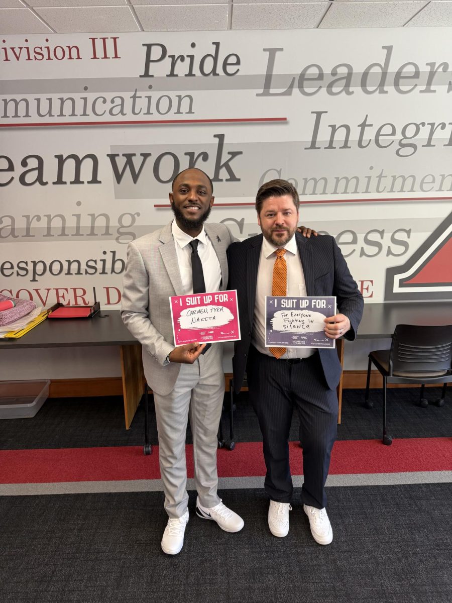 (Left): Aaron Akers, the assistant men's basketball, poses with Travis Mrozek, MATC’s assistant athletics coach. Photo provided by MATC Athletics.