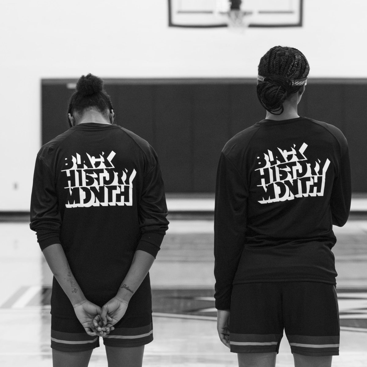 Two Stormers stand side by side in Black History Month warm-up apparel as the National Anthem plays before the recognition game for Black History Month on Thursday February 5, 2026.