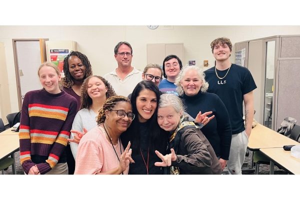 The Deaf Culture Club poses for a picture. Linda Tripi is pictured in the bottom row on the right-hand side. Photo courtesy of Jacqueline Malmstadt and Channetta Winfield.
