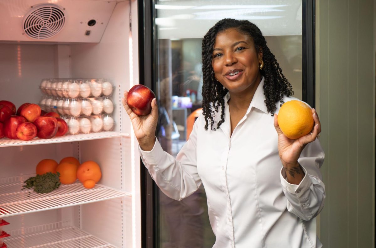 Milwaukee County Board Chairwoman Marcelia Nicholson-Bovell poses for a picture while stocking the community fridge at Metcalfe Park Community Bridges on feb 27, 2026, in Milwaukee, WI.
