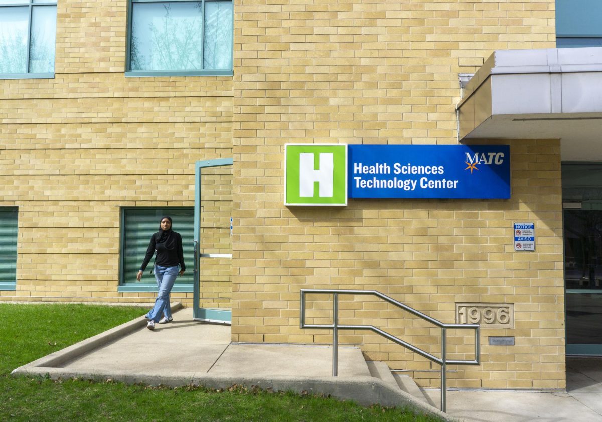 Student leaves the H Building after class, April 13, 2026.