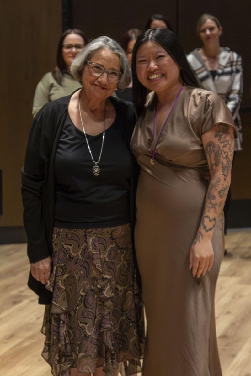 Dental Hygiene program graduate poses with family member