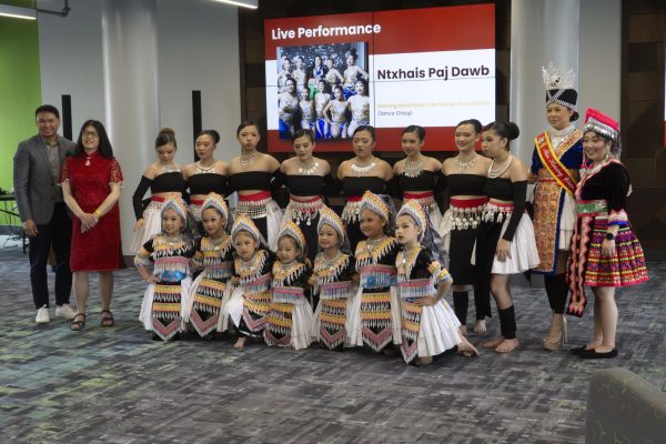 Participants of the Flavors, Fabrics, and Facts event pose for a photo, May 6, 2026