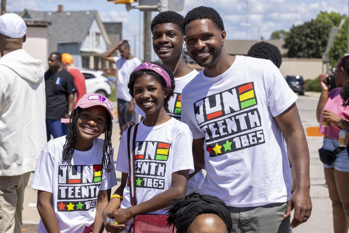 2026 Juneteenth Jubilee Parade viewers pose for a photo