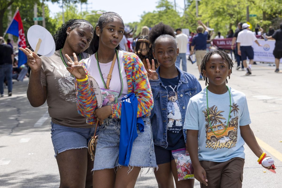 2026 Juneteenth Jubilee Parade viewers pose for a photo