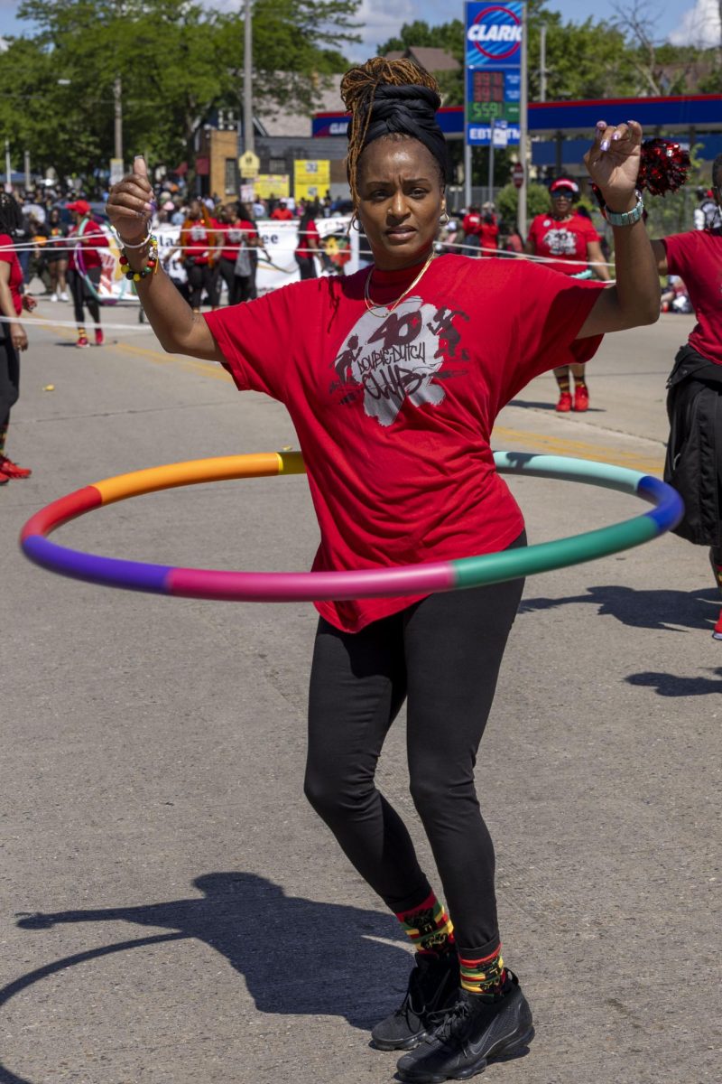 Member of the 40 Double Dutch Club shows off her hoola hoop skills