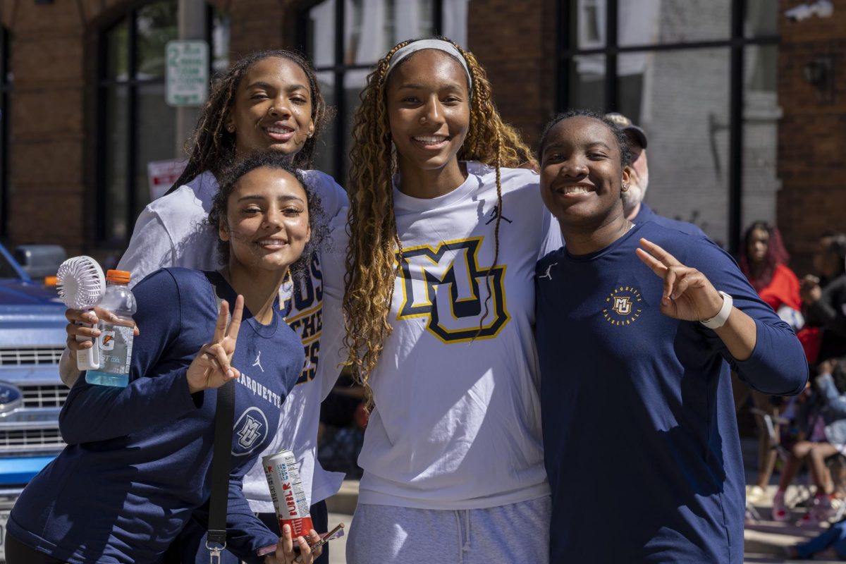 Members of the Marquette Women's Basketball team pose for a photo