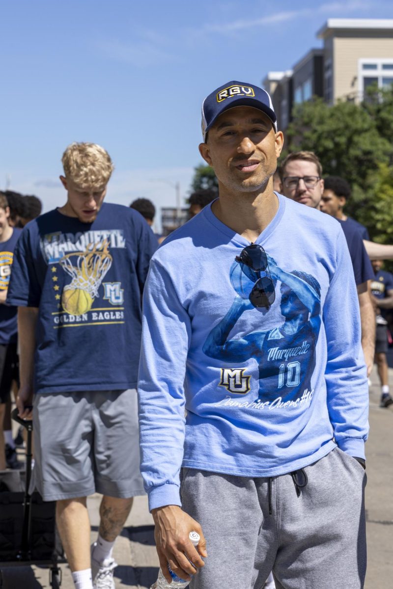 Shaka Smart, head coach of the Marquette Men's Basketball team leads his squad