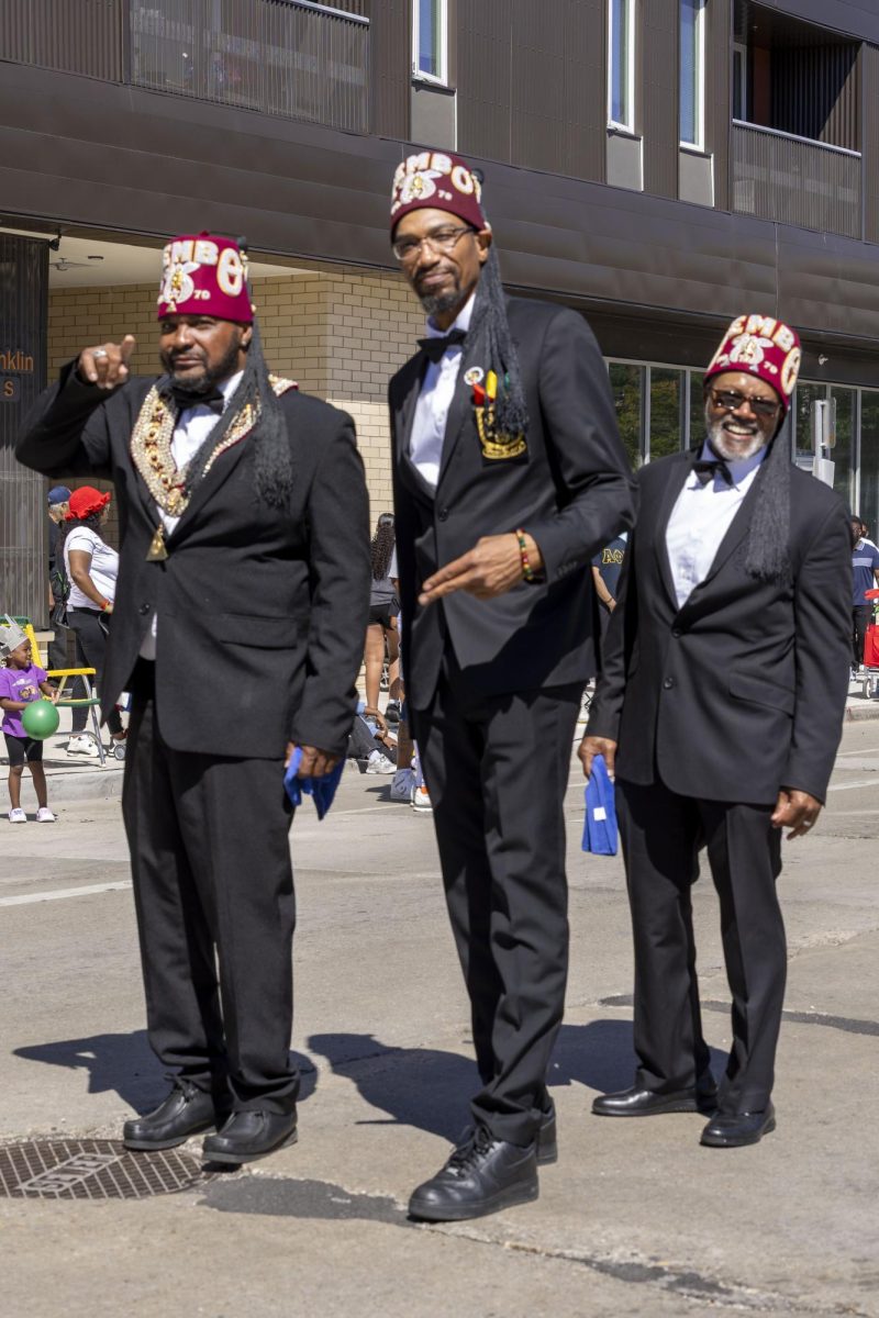 Members of the Ancient Order of Nobles of the Mystic Shrine march in the parade 