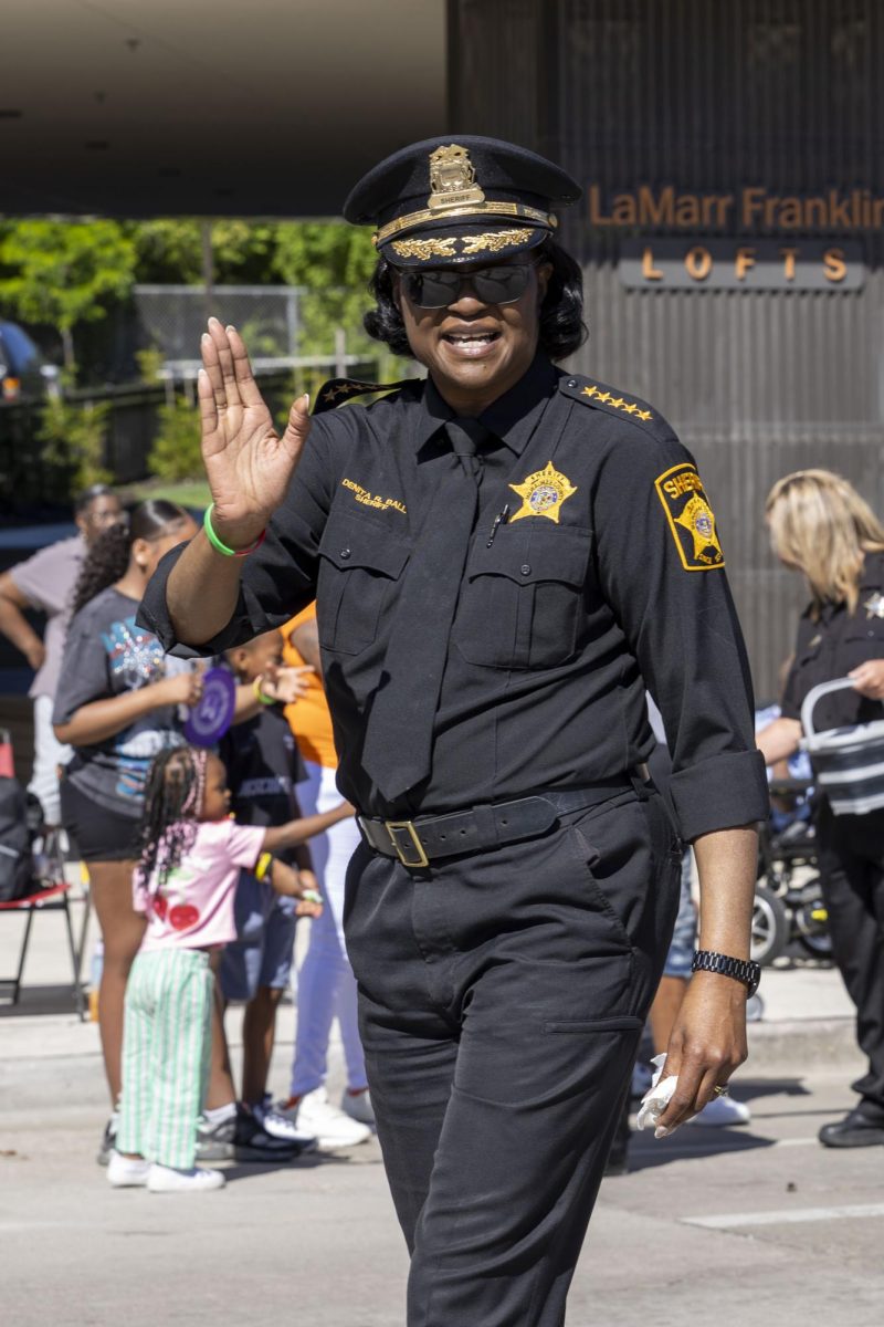 Milwaukee County Sheriff Dr. Denita Ball waves to the crowd 