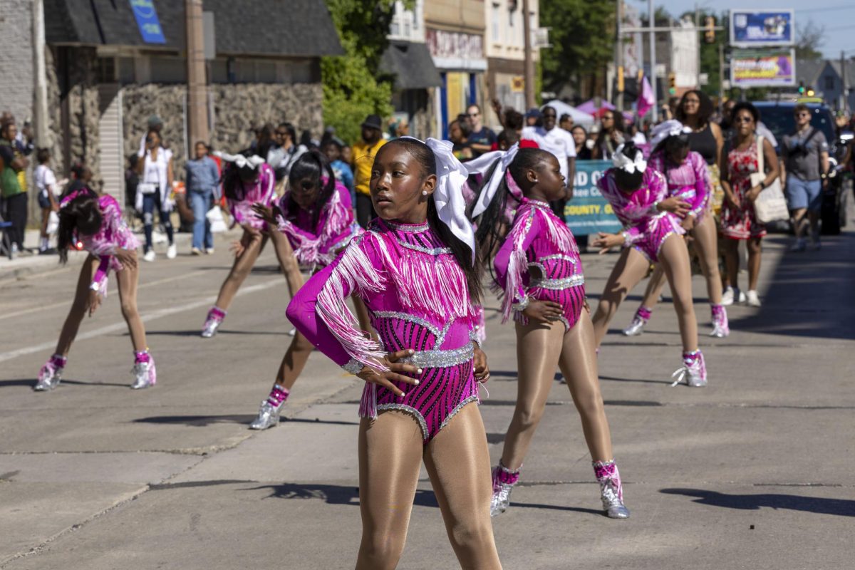 A dance group performs for the crowd