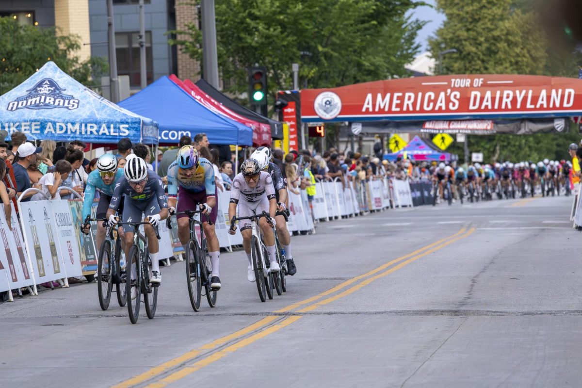 Cyclists jockey for position during a criterium race in downtown Wauwatosa 