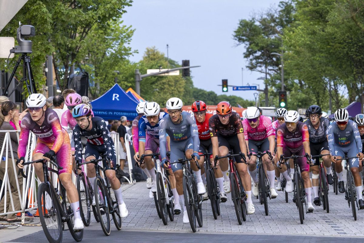 Cyclists set the pace during the early laps of a criterium race