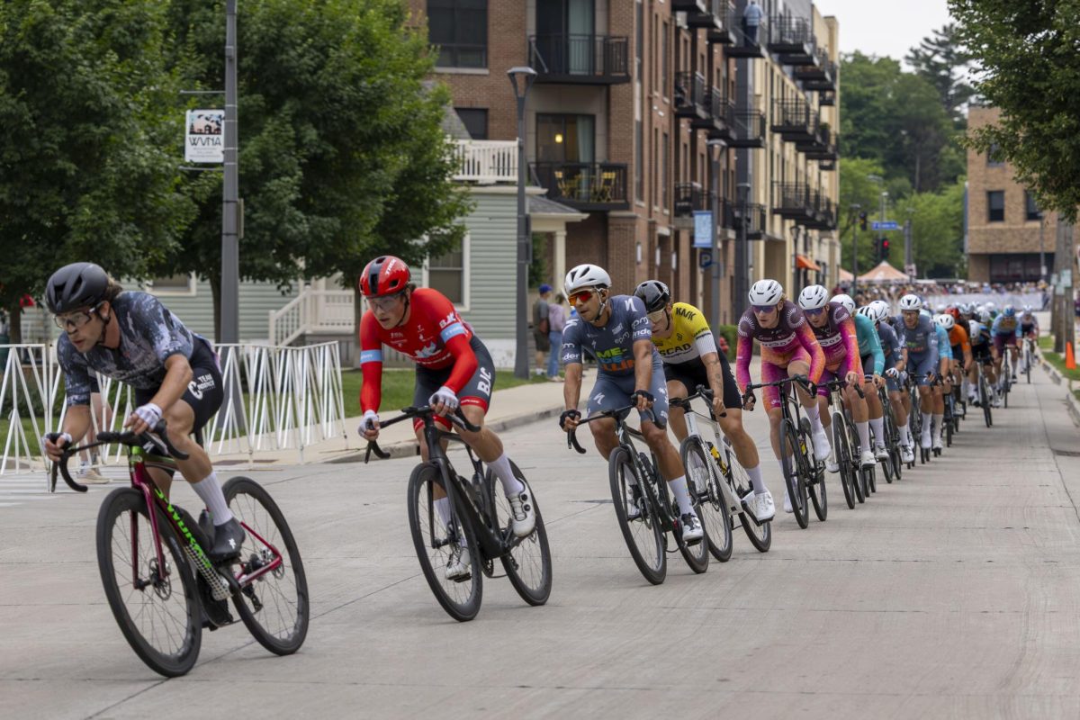 Cyclists ride in a draft formation 