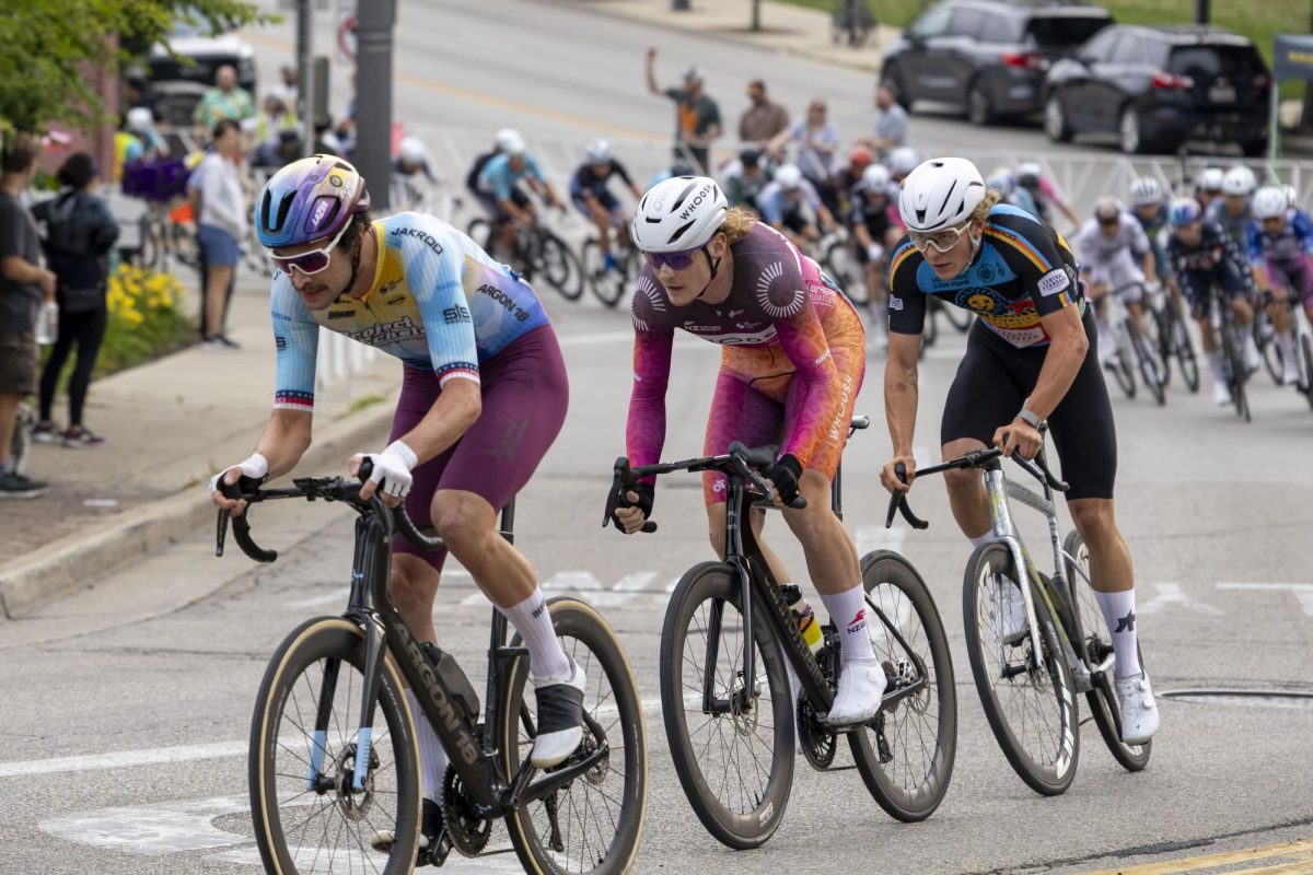 Leading pack of cyclists attack a hill during a criterium race in Wauwatosa
