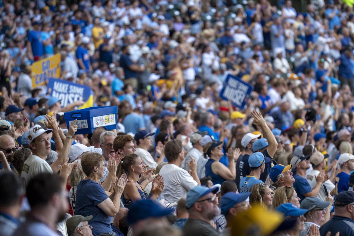 Brewers fans celebrate a Garrett Mitchel home run in the 5th