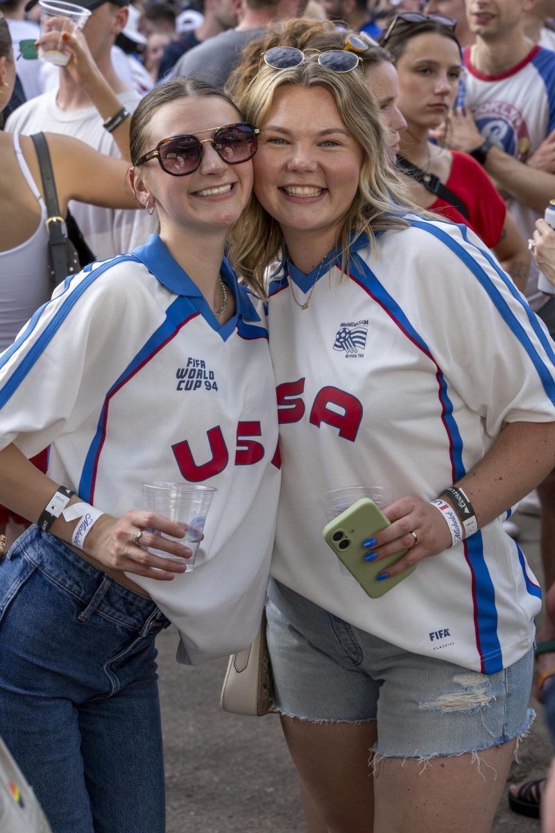 USA fans pose for a photo at Nomad World Pub