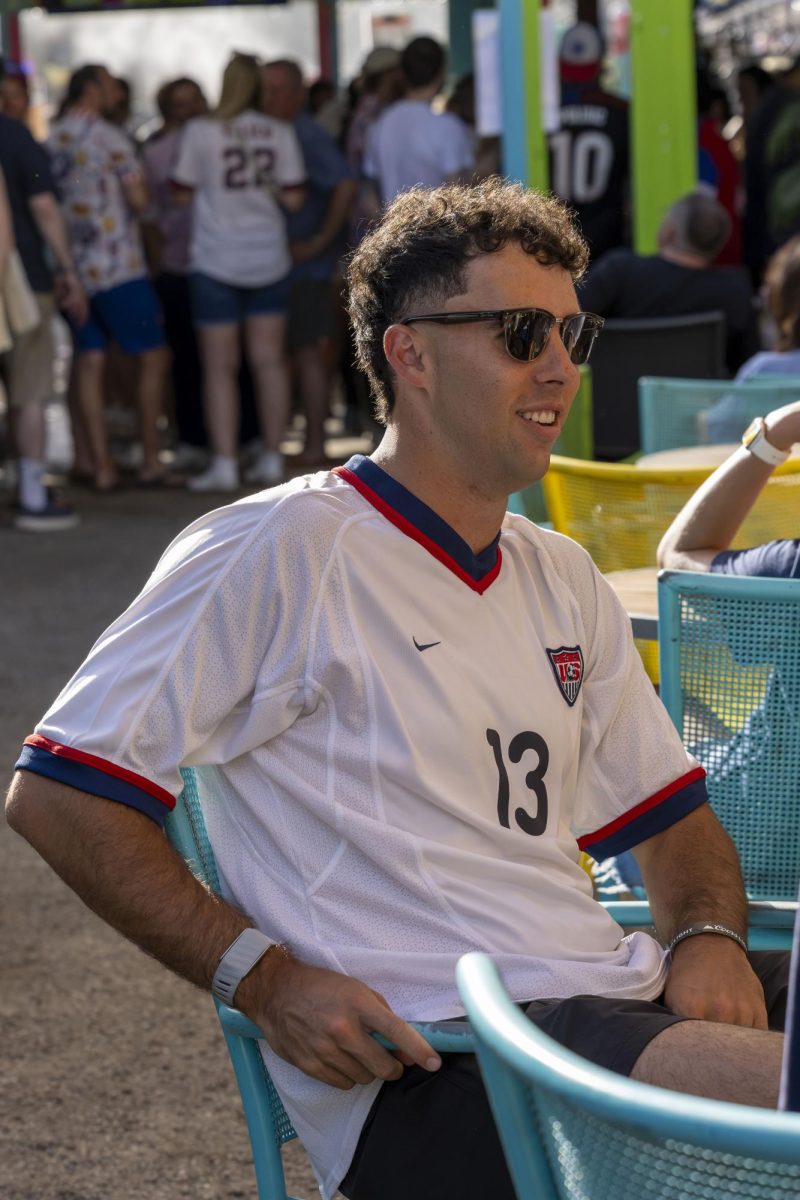 USA fan talks with friends before the start of the teams round of 32 matchup 
