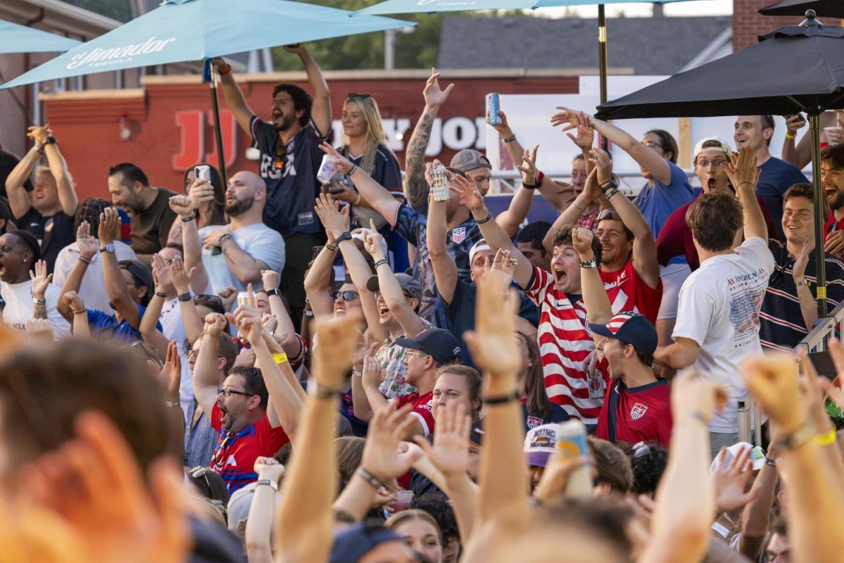 Fans celebrate after the US scores on a free kick 